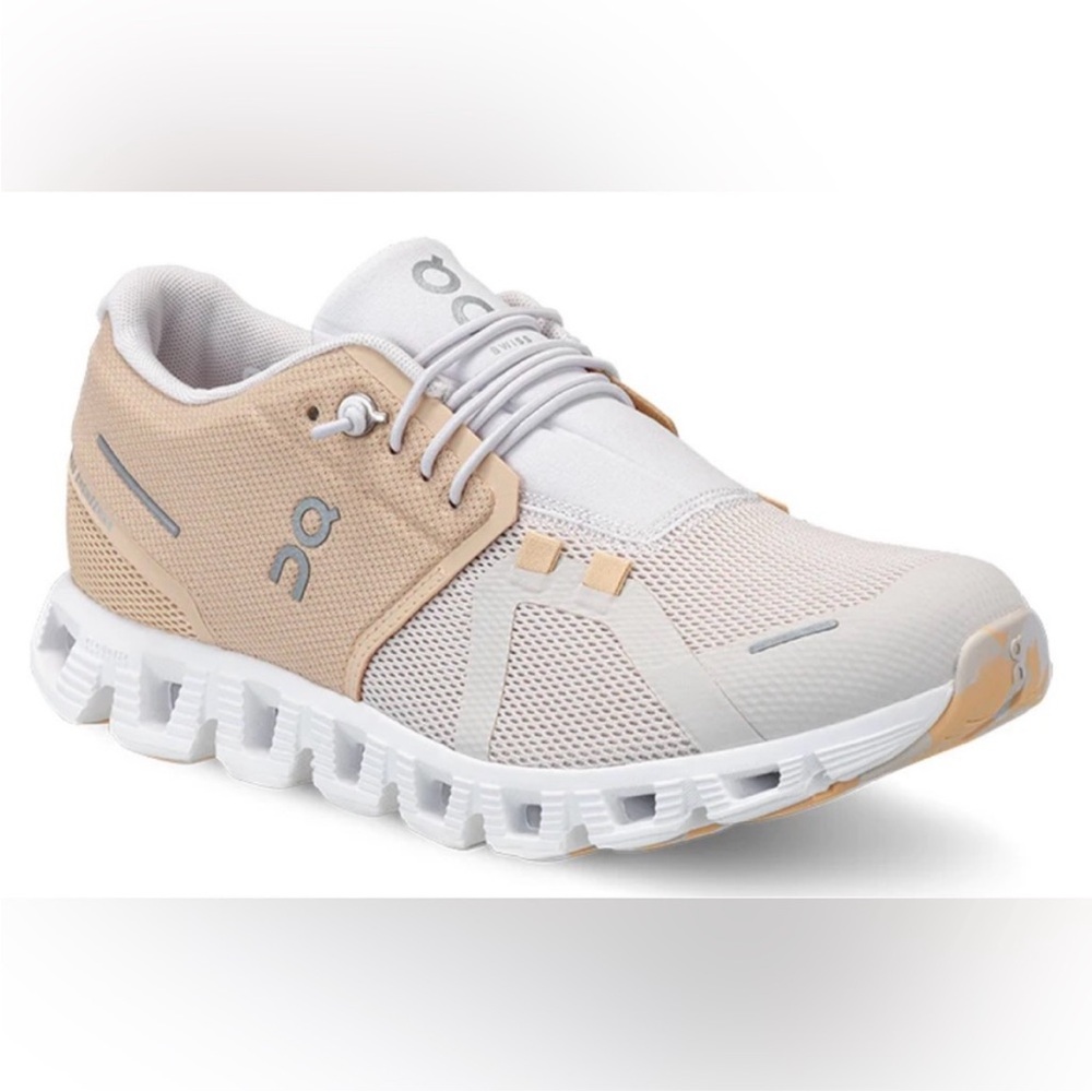 On Running White and Beige Athletic Shoes